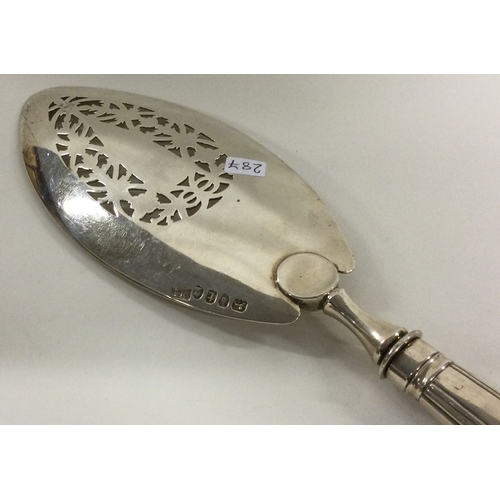 287 - A heavy 18th Century silver fish slice. London 1794. By Michael Plummer. Approx. 159 grams. Est. £12... 