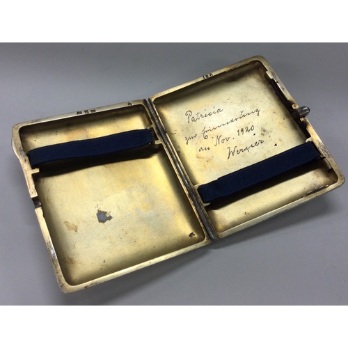 289 - A silver and white enamelled cigarette case. Marked to interior. Approx. 157 grams. Est. £300 - £500... 