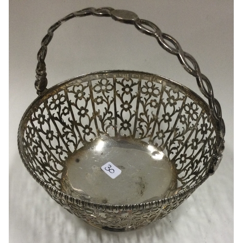 30 - A George III silver basket. London 1759. By William Plummer. Approx. 129 grams. Est. £80 - £120.