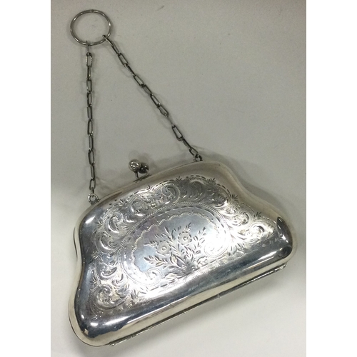 303 - A silver purse with swag decoration. Birmingham. Circa 1910. Approx. 89 grams. Est. £50 - £80.