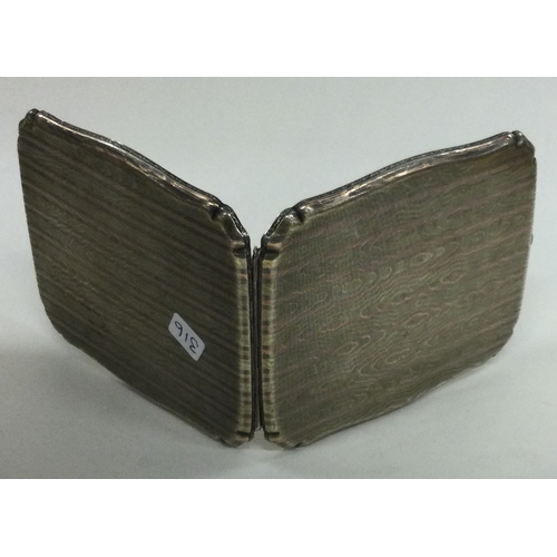 316 - An engraved silver cigarette case with gold inlay, bearing import marks. Approx. 103 grams. Est. £10... 