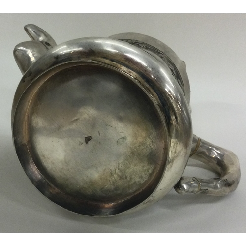 325 - A Chinese export silver teapot. Marked to base. Approx. 400 grams. Est. £300 - £500.