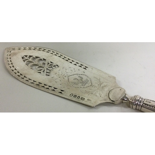 341 - An 18th Century Georgian silver fish slice. London 1788. Approx. 144 grams. Est. £120 - £150.