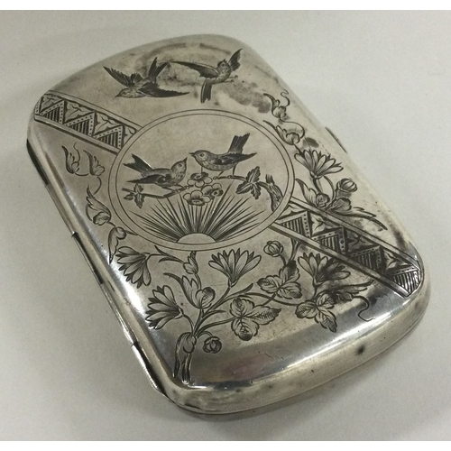 35 - A Victorian silver Aesthetic Movement cigarette case engraved with owls and other birds. Birmingham ... 