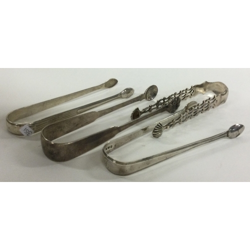 351 - A selection of four silver sugar tongs. Various dates and makers. Approx. 155 grams. Est. £80 - £120