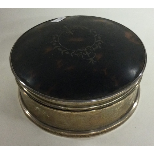 357 - A silver and tortoiseshell jewellery box. Birmingham 1884. Approx. 223 grams of gross weight. Est. £... 