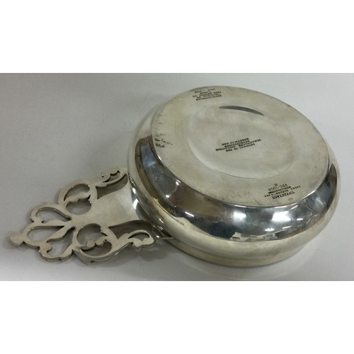 360 - TIFFANY & CO: A large silver wine taster. Circa 1900. Approx. 250 grams. Est. £180 - £220.