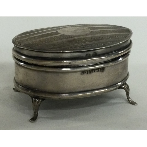 362 - A silver engine turned jewellery box. Birmingham 1907. Approx. 62 grams. Est. £30 - £50.