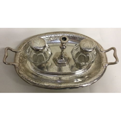 366 - A large Victorian silver inkstand with chamberstick to centre. London 1863. By Henry Wilkinson. Appr... 