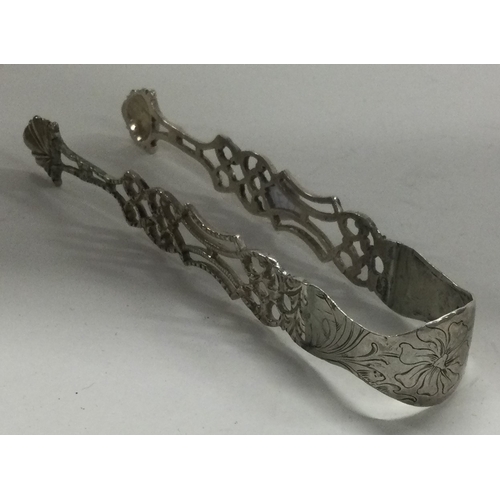 374 - A pair of Victorian silver figural sugar tongs. Approx. 27 grams. Est. £30 - £50.