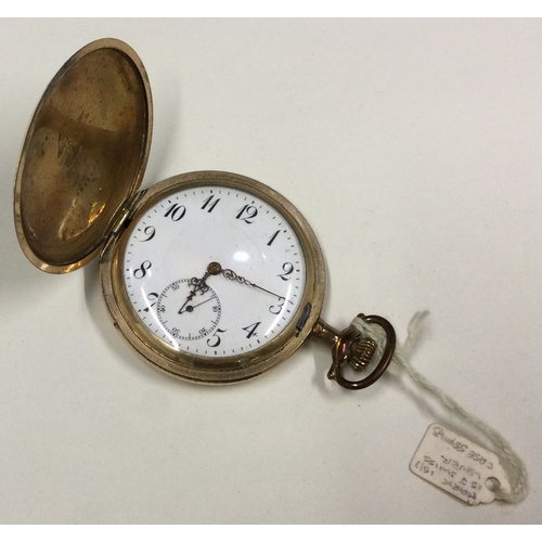 393 - A stylish gold plated pocket watch. Approx. 87 grams. Est. £20 - £30.