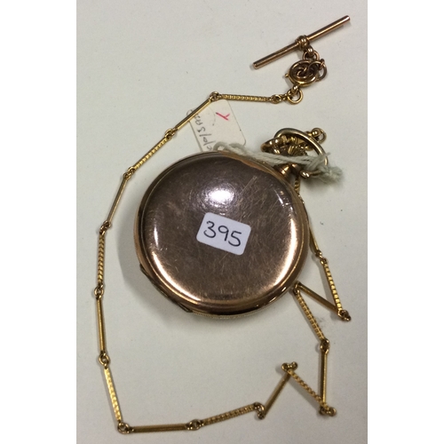 395 - A slim gold plated pocket watch on matching chain. Approx. 65 grams. Est. £30 - £50.