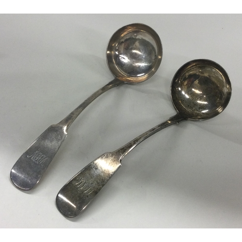 42 - EDINBURGH: A pair of Scottish Georgian silver sauce ladles. 1802. By R&R Kay. Approx. 67 grams. Est.... 