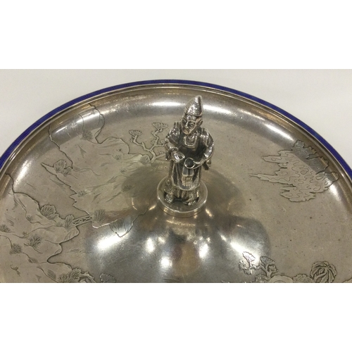 441 - A Chinese export silver and enamelled dish chased with temples, flowers, boats and ducks. Approx. 54... 