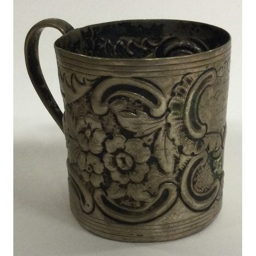 444 - An 18th Century silver mug. Marked to base. Approx. 86 grams. Est. £60 - £80.