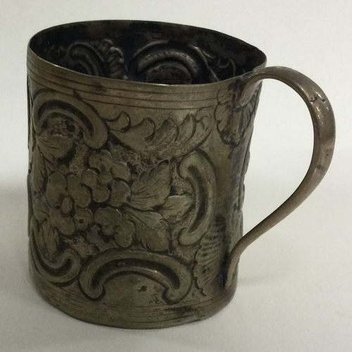 444 - An 18th Century silver mug. Marked to base. Approx. 86 grams. Est. £60 - £80.