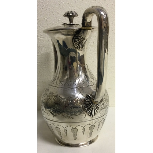 451 - A large Victorian silver coffee pot finely engraved. London 1846. By Joseph Angel. Approx. 876 grams... 