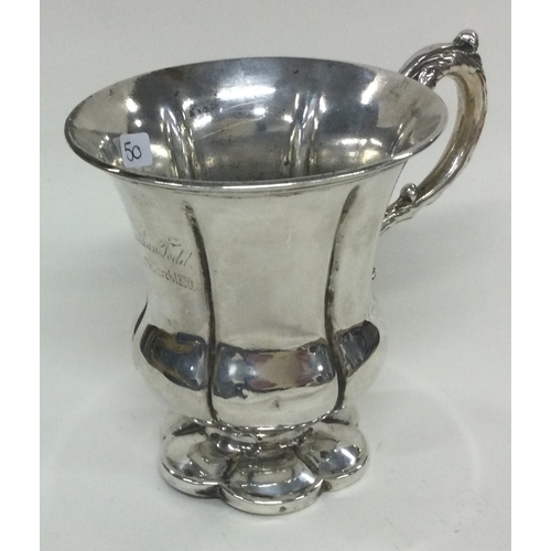 50 - A William IV silver mug. London 1835. Approx. 145 grams. Est. £120 - £150.