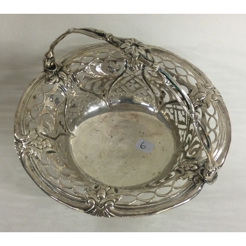 6 - An 18th Century silver swing handled basket. Maker and Lion marks only. By Thomas Pitts. Approx. 121... 