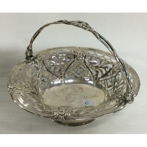 6 - An 18th Century silver swing handled basket. Maker and Lion marks only. By Thomas Pitts. Approx. 121... 