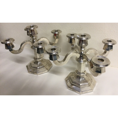 64 - A large pair of silver candelabra. Marked to base. Approx. 3500 grams of gross weight. Est. £1200 - ... 