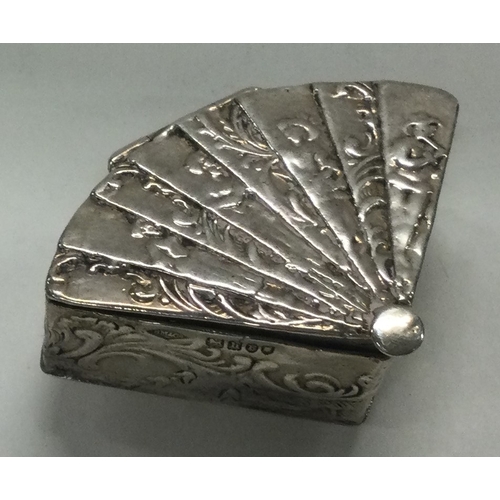 65 - A silver hinged box bearing import marks. Marked to side. Approx. 36 grams. Est. £40 - £60.