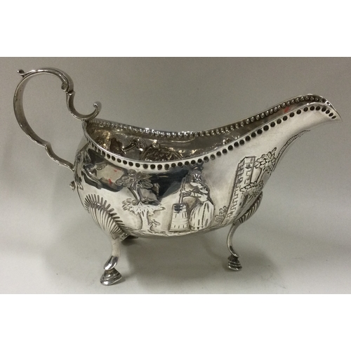 66 - An Irish silver sauceboat. Dublin. Circa 1770. By MW. Approx. 118 grams. Est. £100 - £150.