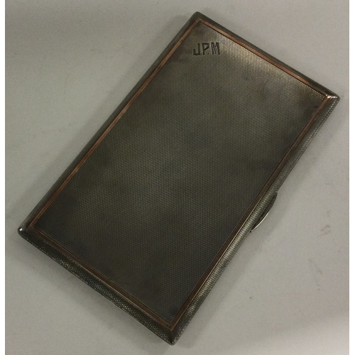 788 - A heavy engine turned silver cigarette case. London. Approx. 219 grams. Est. £80 - £120.