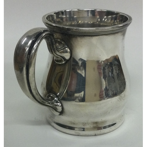 93 - A rare American silver mug enamelled with flags. Circa 1900. Approx. 218 grams. Est. £200 - £300.