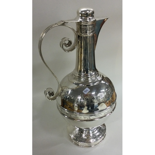 94 - A rare Victorian silver communion wine jug. Sheffield 1879. By Henry Wilkinson. Approx. 722 grams. E... 