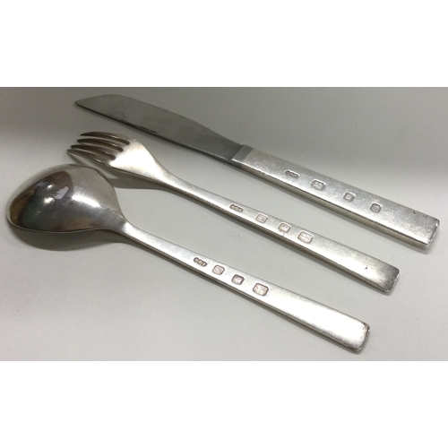 453 - A three-piece silver cutlery set. London 1966. By Gerald Benney. Approx. 123 grams. Est. £150 - £200... 