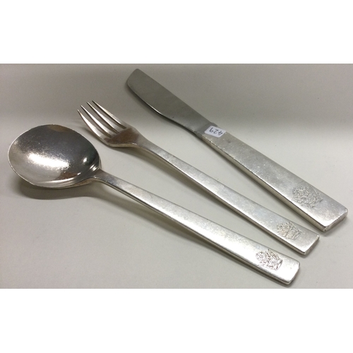 453 - A three-piece silver cutlery set. London 1966. By Gerald Benney. Approx. 123 grams. Est. £150 - £200... 