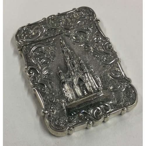 103 - A fine chased silver castle top card case with embossed decoration depicting the Scott Memorial. Bir... 