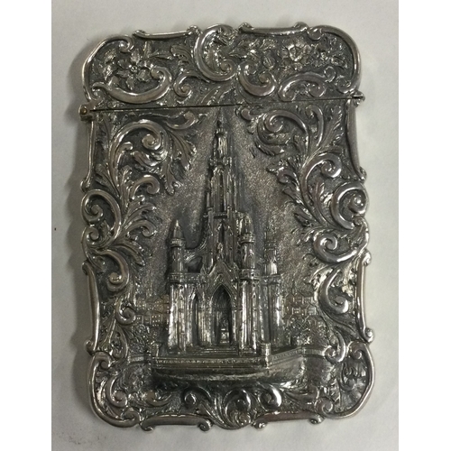 103 - A fine chased silver castle top card case with embossed decoration depicting the Scott Memorial. Bir... 