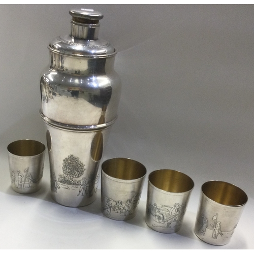 12 - OF GOLFING INTEREST: A rare silver plated cocktail shaker with stacking beakers. Est. £400 - £600.
