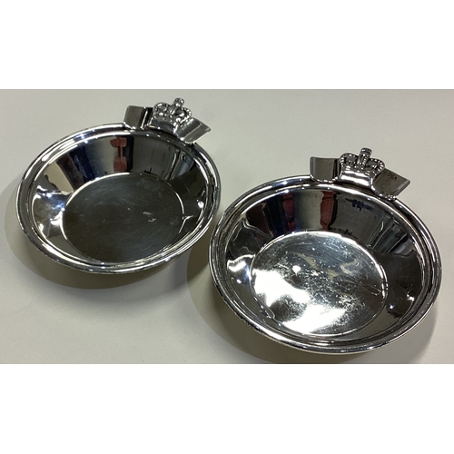 182 - OF ROYAL INTEREST: A pair of silver ashtrays / dishes decorated with crowns. Birmingham 1936. By Huk... 