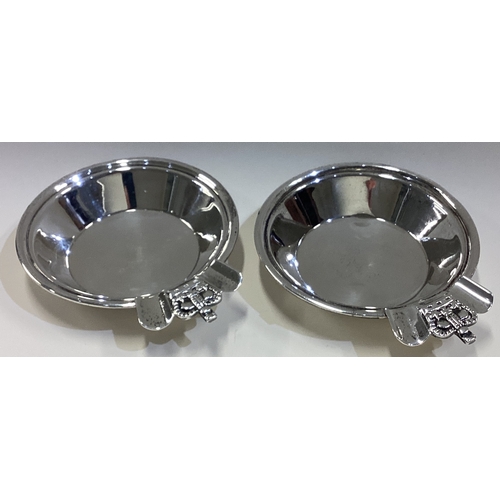 182 - OF ROYAL INTEREST: A pair of silver ashtrays / dishes decorated with crowns. Birmingham 1936. By Huk... 