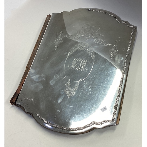 215 - A large silver faced desk blotter with swag decoration. London 1905. By Goldsmiths. Est. £200 - £300... 