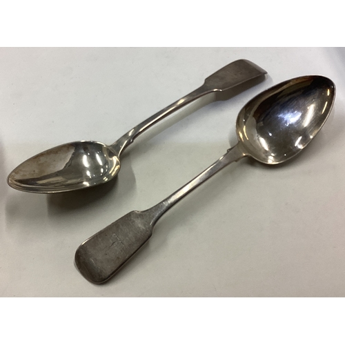 602 - DUBLIN: A good large pair of silver rat tail tablespoons. Approx. 159 grams. Est. £60 - £80.