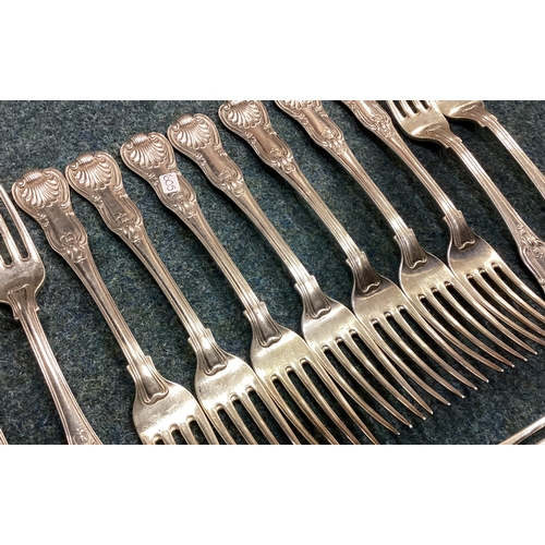 605 - A heavy set of twelve silver honeysuckle pattern table forks. London. By GA. Approx. 1218 grams. Est... 