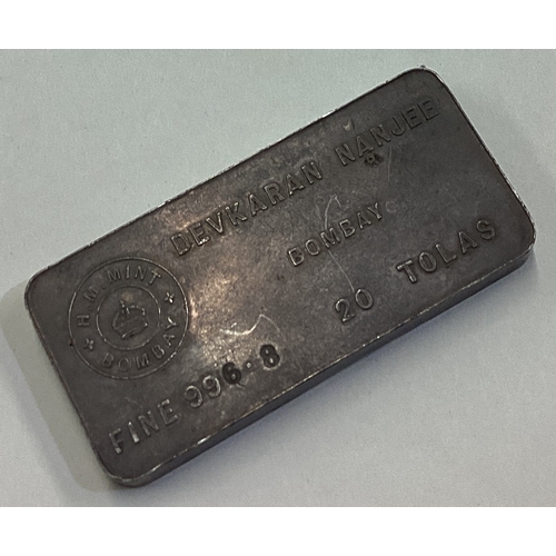 609 - A heavy silver ingot. Approx. 233 grams. Est. £80 - £120.