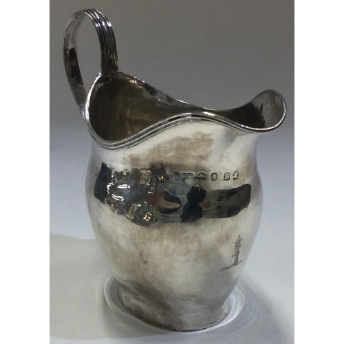 615 - A Georgian silver cream jug. London 1801. Approx. 82 grams. Est. £80 - £120.