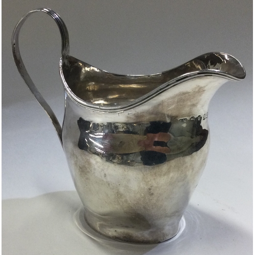 615 - A Georgian silver cream jug. London 1801. Approx. 82 grams. Est. £80 - £120.