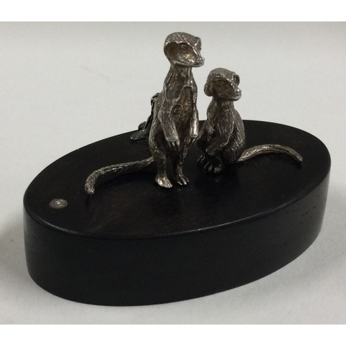 625 - PATRICK MAVROS: A silver menu / place card holder cast with meerkats. Approx. 51 grams of gross weig... 