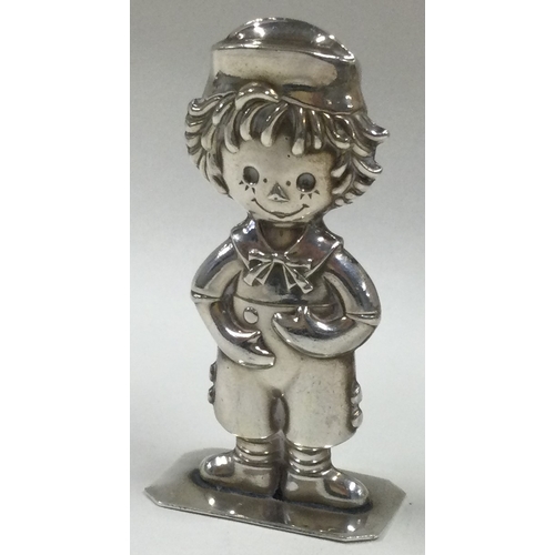 653 - A silver figural table toy. Approx. 16 grams. Est. £20 - £30.