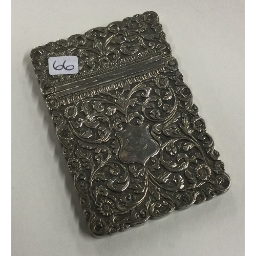 66 - A 19th Century Indian Kutch silver card case with chased decoration. Marked inside. Approx. 84 grams... 