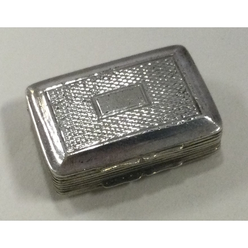 81 - An engine turned George III silver vinaigrette. Birmingham 1824. By John Bettridge. Approx. 13 grams... 
