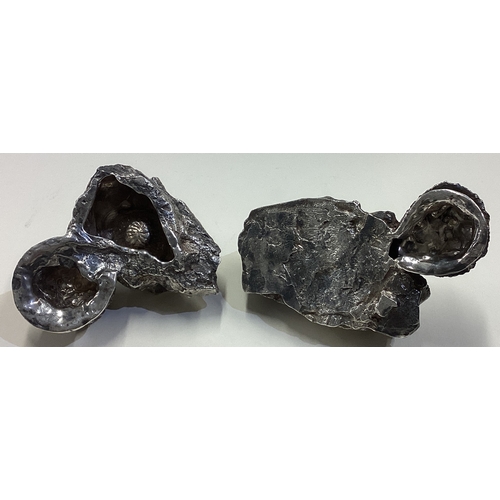 95 - PATRICK MAVROS: A rare pair of cast silver candlesticks. Circa 2000. Approx. 601 grams. Est. £800 - ... 