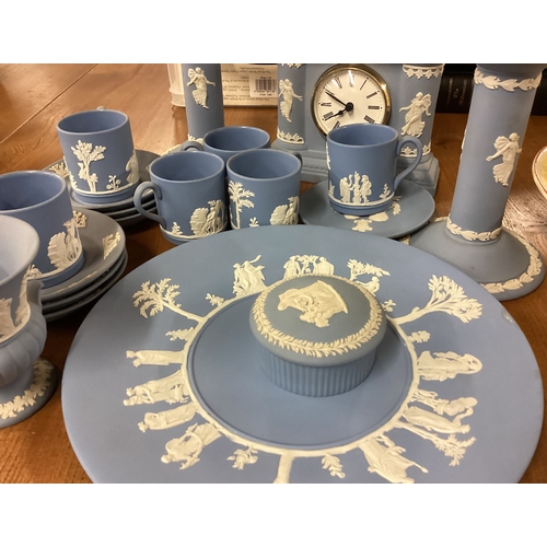 103 - A large collection of blue and white Wedgwood jasperware etc. Est. £20 - £30.