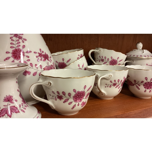 131 - A decorative floral tea service. Est. £20 - £30.